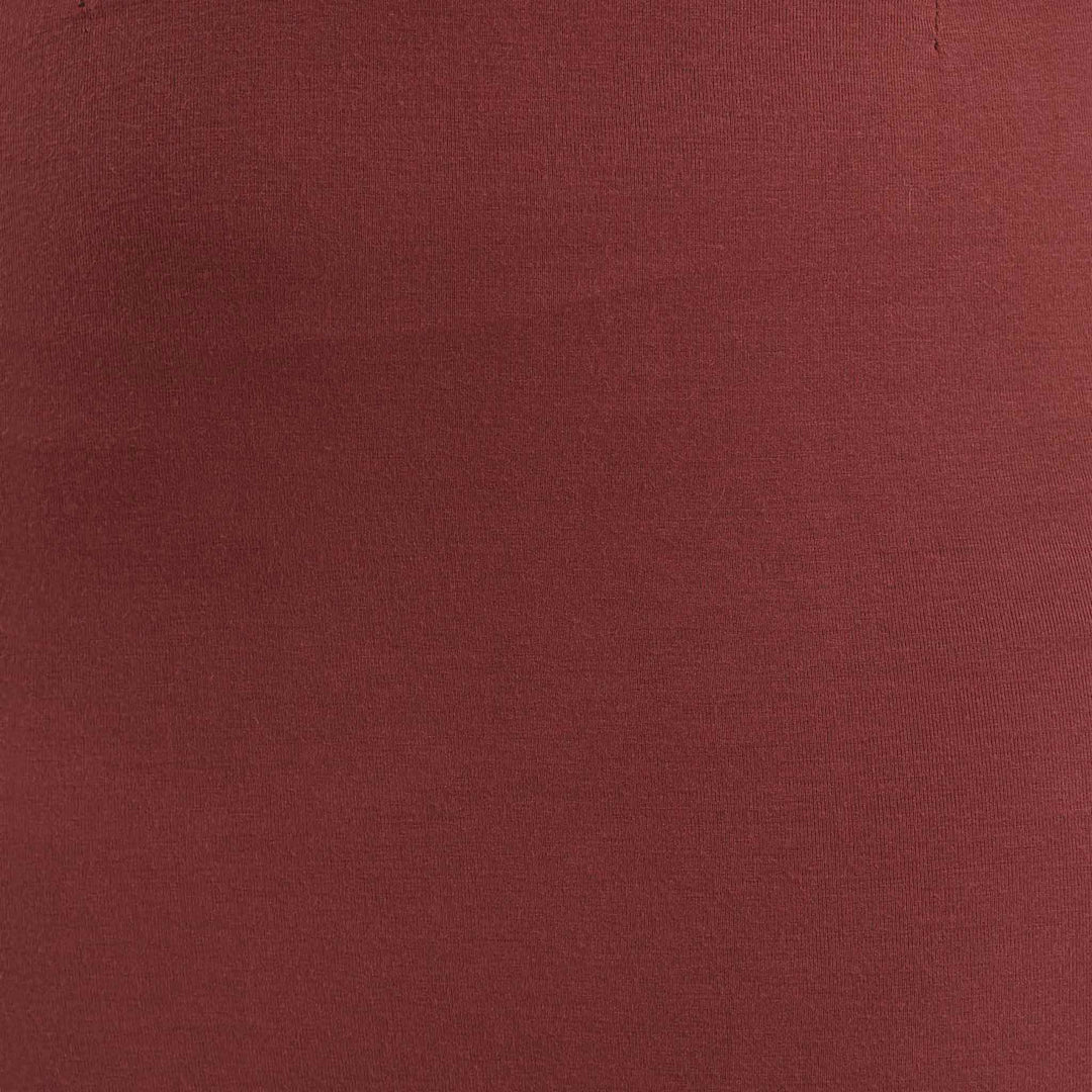 High-waisted pencil skirt from The Shapes United, shown in a sleek, fitted style perfect for stylish office wear.