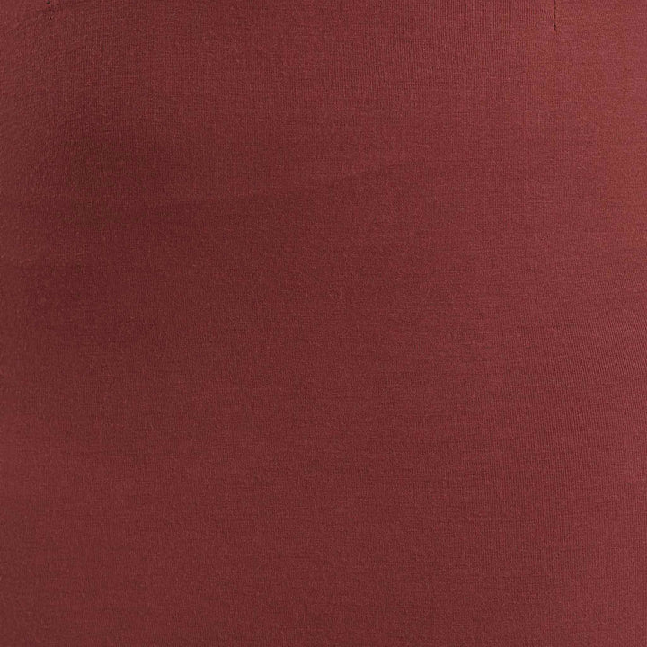High-waisted pencil skirt from The Shapes United, shown in a sleek, fitted style perfect for stylish office wear.
