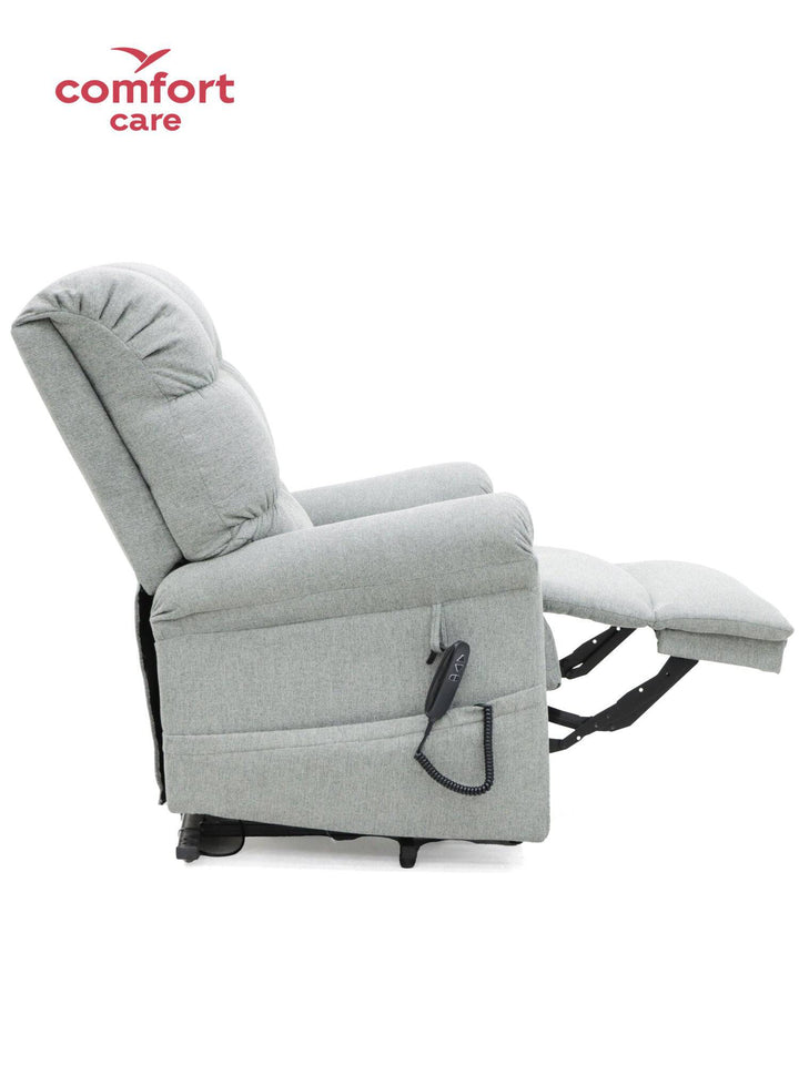 Comfort Care Cloud 2 motor power lift recliner by Pinnacle showing plush fabric, padded armrests, and adjustable reclining position.