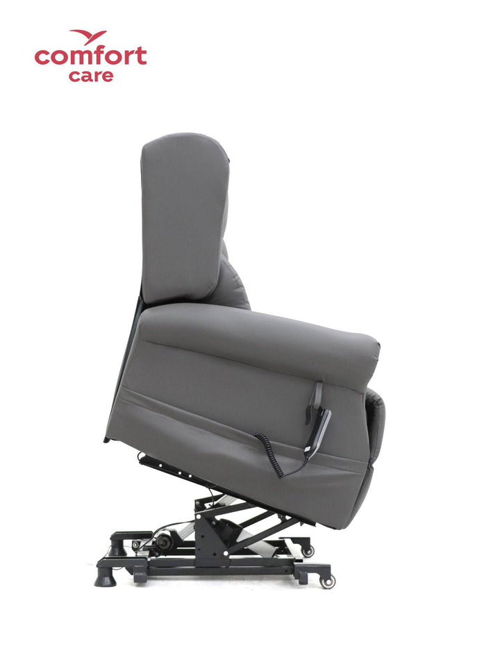 Pinnacle Comfort Care One 5 Motor Power Lift Recliner in a cozy living room setting with plush upholstery and armrests.