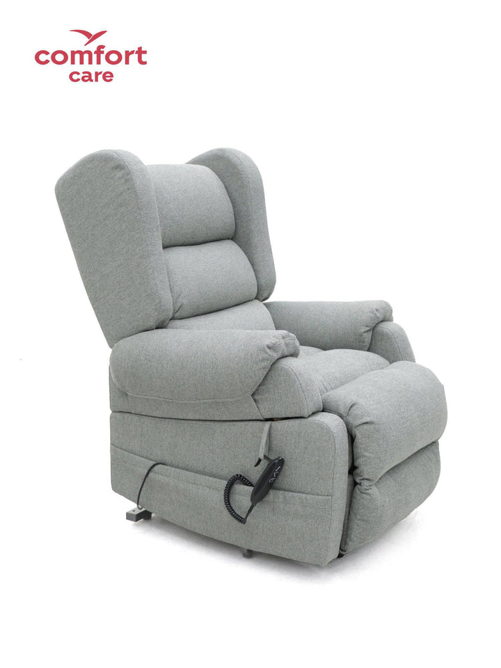 Pinnacle Comfort Care Viva 2 Motor Power Lift Recliner in a cozy setting, showcasing its adjustable reclining feature.