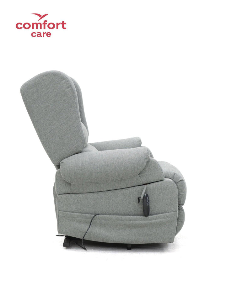 Pinnacle Comfort Care Viva 2 Motor Power Lift Recliner in a cozy living room setting with plush upholstery and raised footrest.