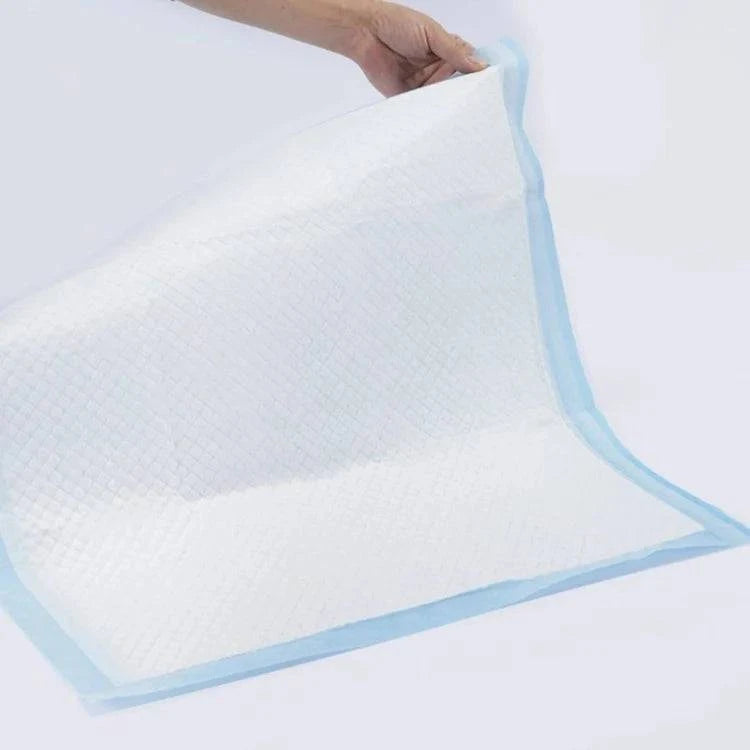 Brolly Disposable Bed Pad 60cm x 90cm designed for continence protection on bedding surfaces.