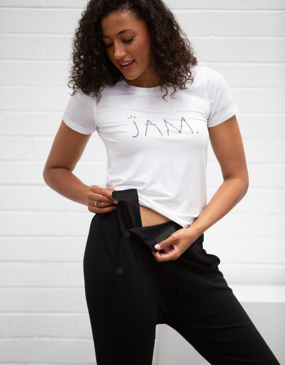 JAM the Label High Waisted Pant 2.0 in a stylish fit, showcasing fabric texture and sleek design details.