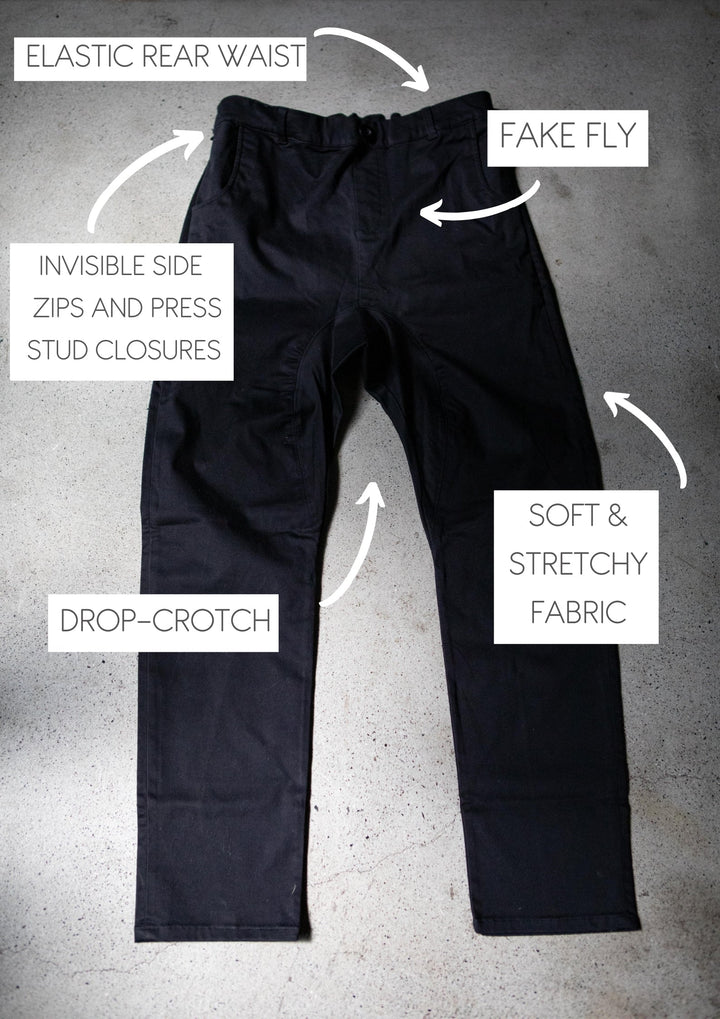 JAM the Label chino pant in a relaxed fit, featuring a classic design and neutral color, displayed on a hanger.