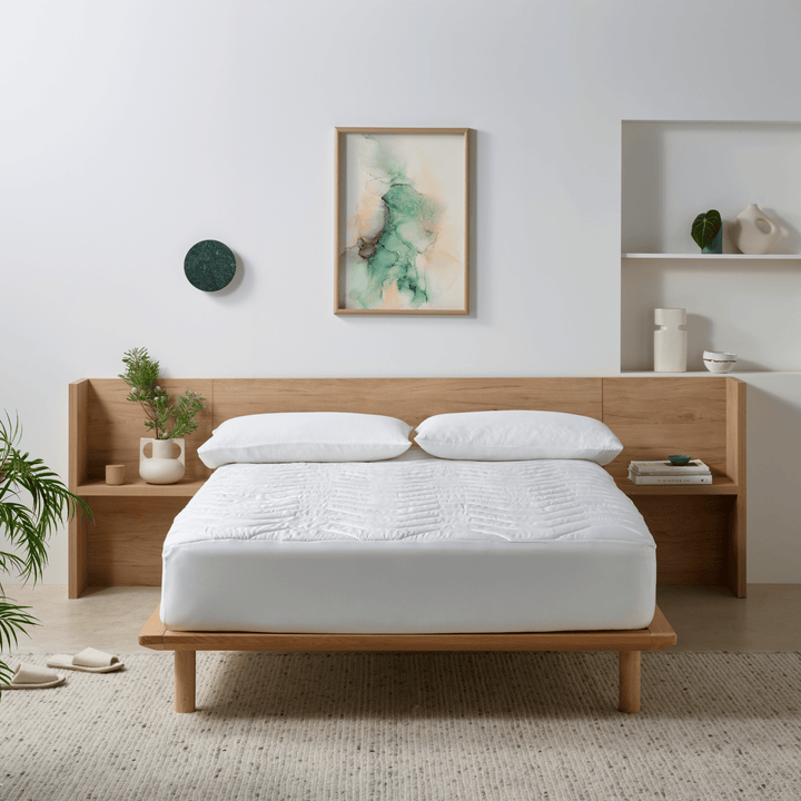 Staydry bamboo quilted mattress protector on a mattress, showing soft, breathable fabric and quilted design for comfort and protection.