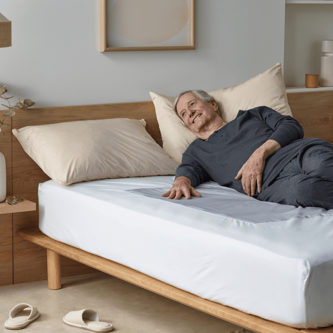 Staydry Mobility Assist waterproof bed protector with absorbent fabric and waterproof layer for enhanced bed protection.
