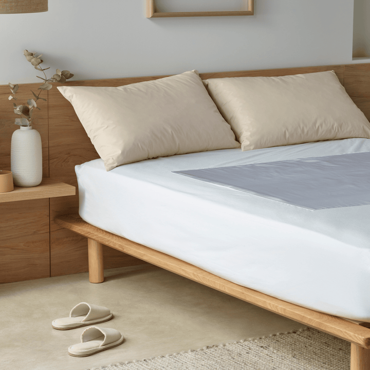 Staydry Mobility Assist Waterproof Bed Protector with absorbent surface and waterproof backing for enhanced bed protection.