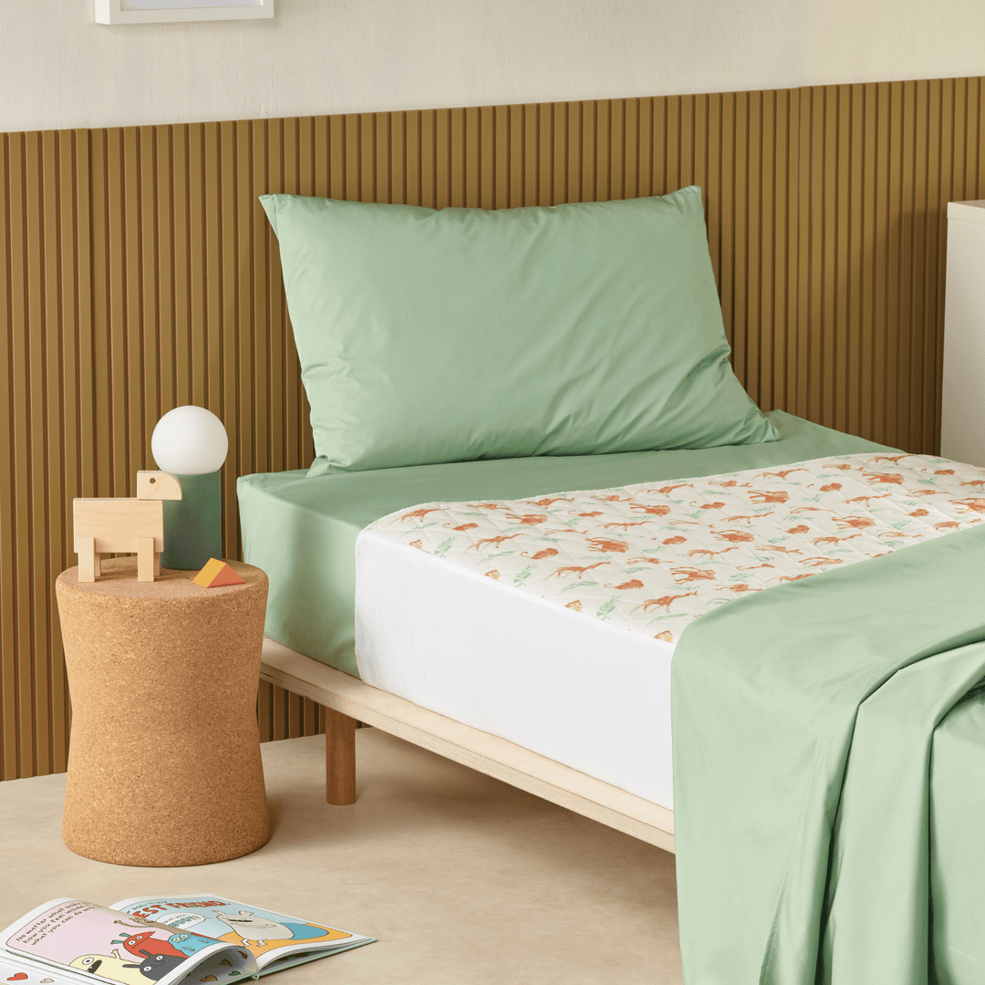 Staydry Little Boss Kids bed pad made of soft cotton Manchester fabric, designed to protect mattresses from spills and accidents.