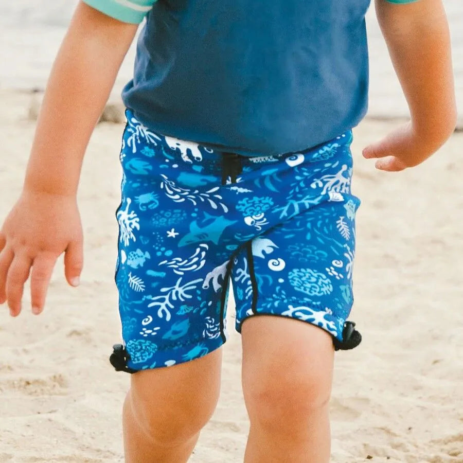 Conni Kids Containment Swim Short in ocean blue, featuring a comfortable fit for active children at the pool or beach.