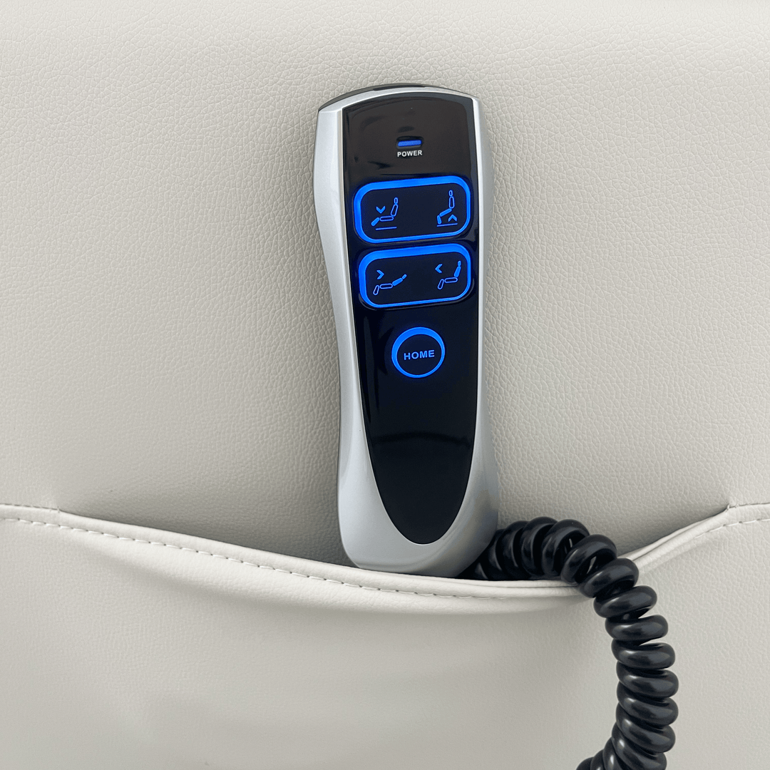 Pinnacle ComfortCare Zen massage lift recliner in soft beige fabric with padded armrests and built-in massage controls.