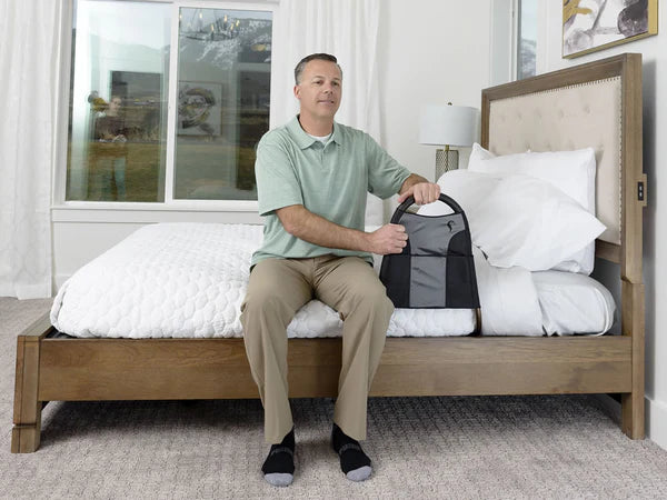 Lightweight Quintro Healthcare Stander Bedside Econorail with organizer pouch, designed for safe, portable bed assistance.