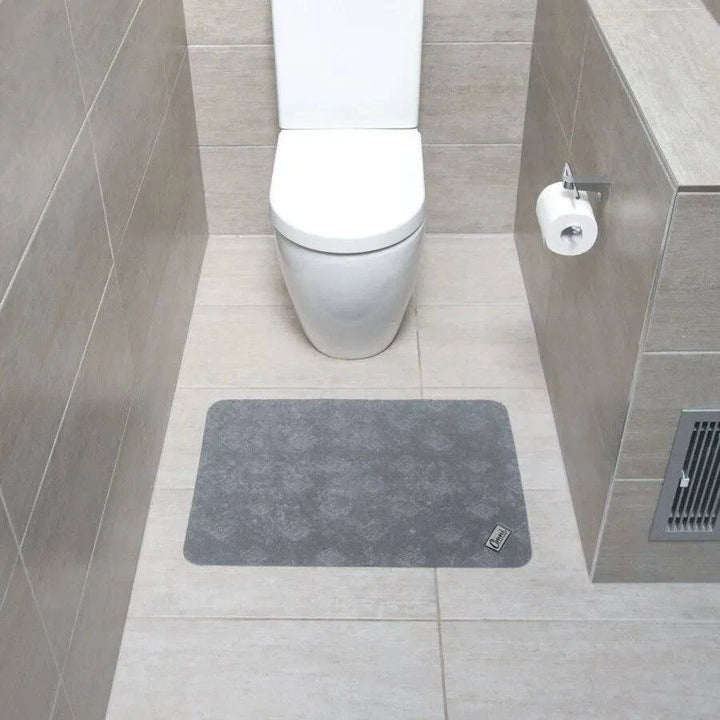 Conni Manchester compact floor mat, soft and durable, with a textured surface suitable for indoor use.