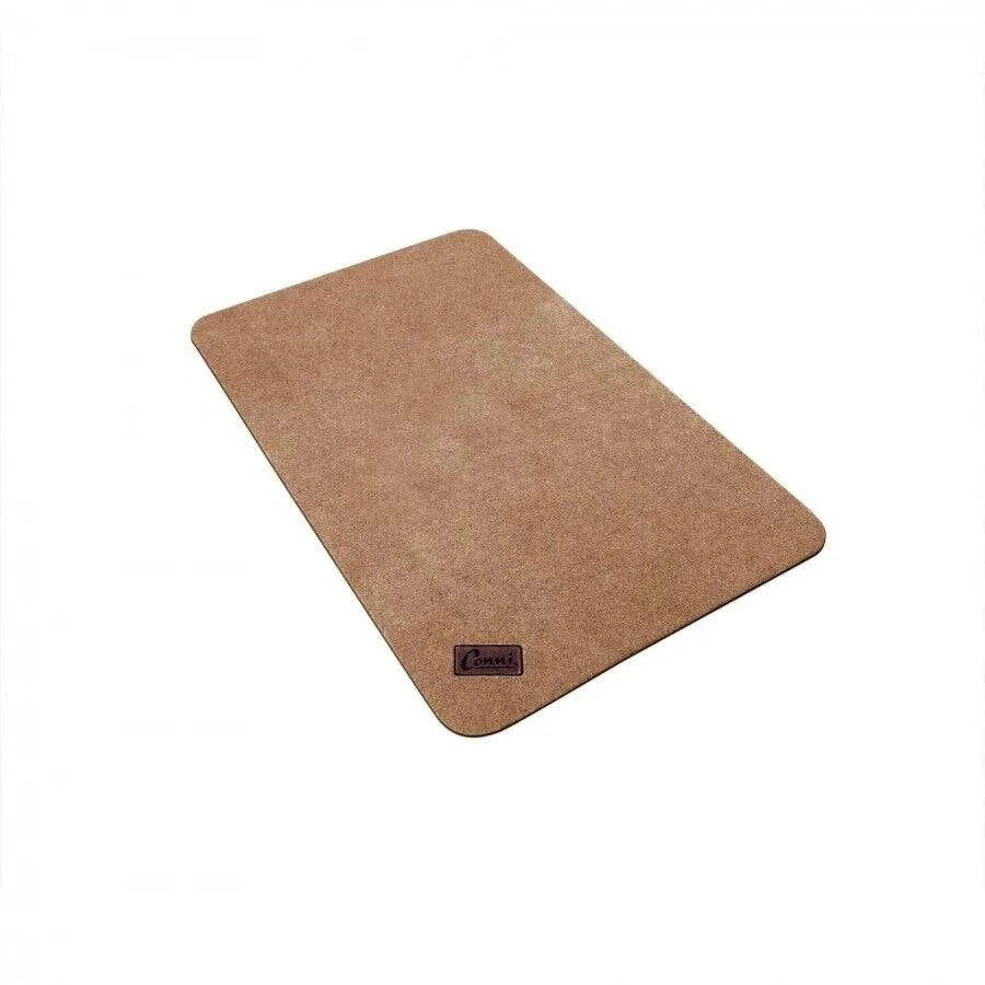 Conni compact pebble Manchester floor mat with textured pebble design, ideal for modern home decor.