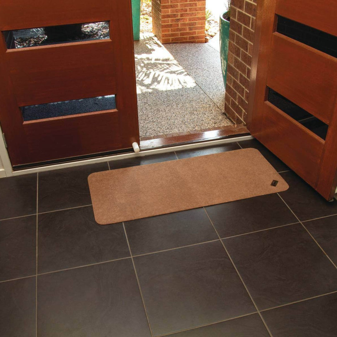 Conni anti-slip and absorbent Manchester floor mat mid runner in neutral tones, featuring textured surface and durable backing.