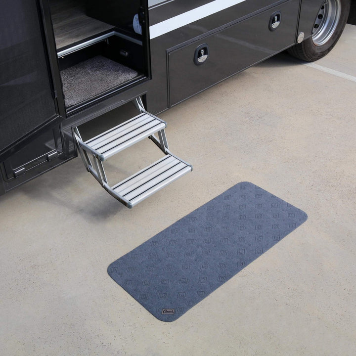 Conni anti-slip and absorbent floor mat mid runner in Manchester style with textured surface and non-slip backing.