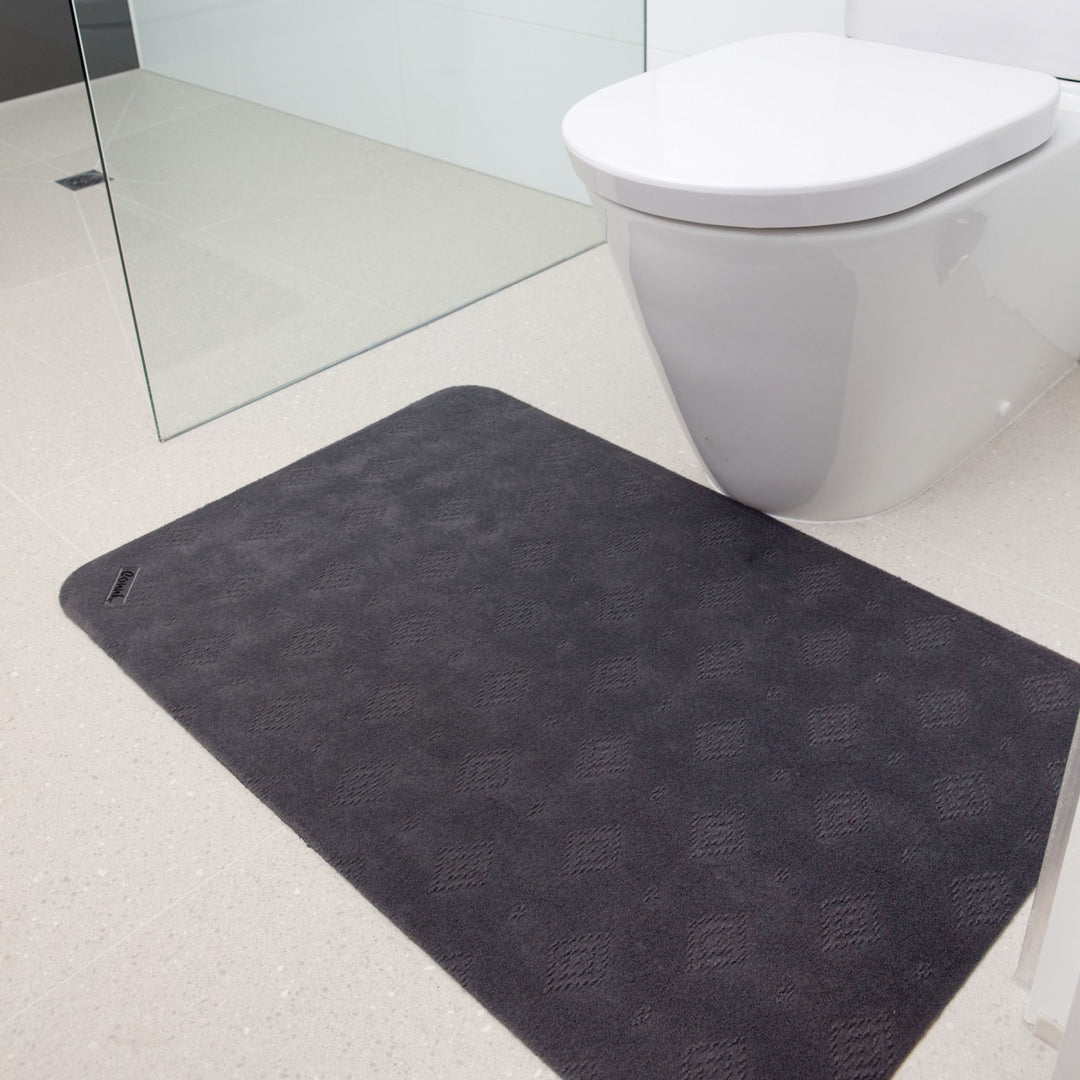Conni classic grey anti-slip and absorbent Manchester floor mat with textured surface for bathroom safety and comfort