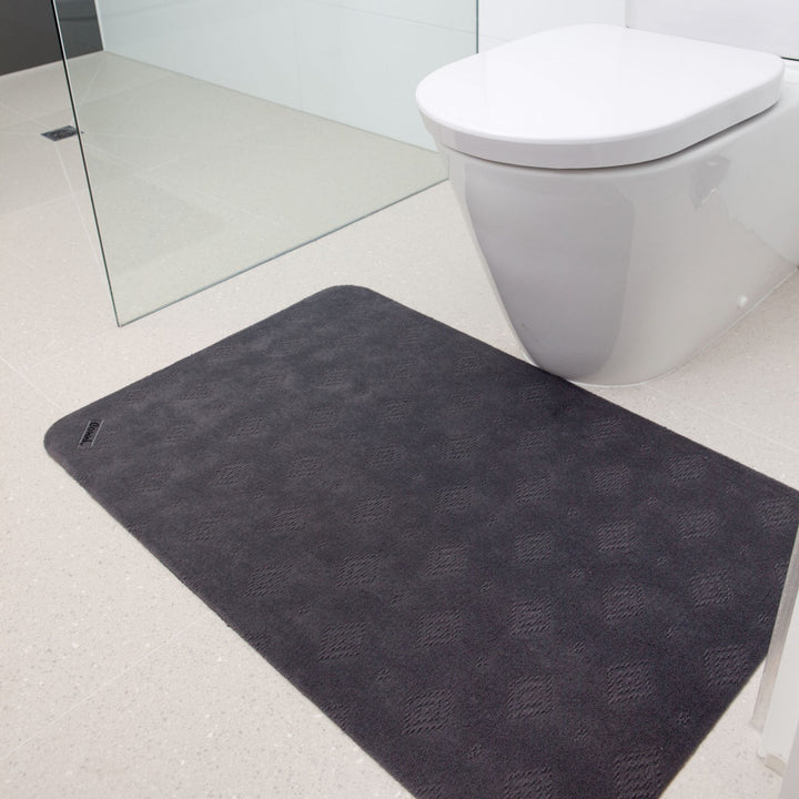 Conni classic grey anti-slip and absorbent Manchester floor mat with textured surface for bathroom safety and comfort