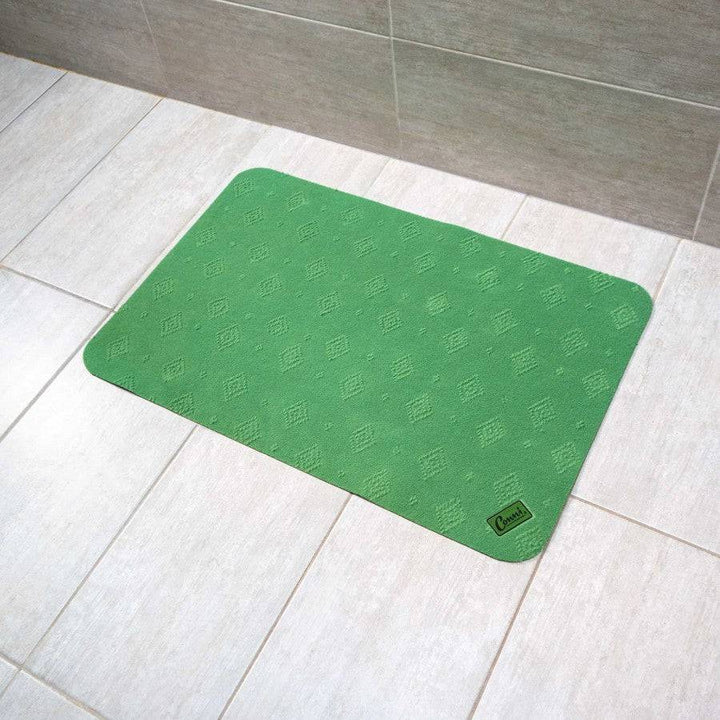 Green Conni anti-slip absorbent floor mat with classic design, ideal for safety and moisture absorption in home or office spaces.