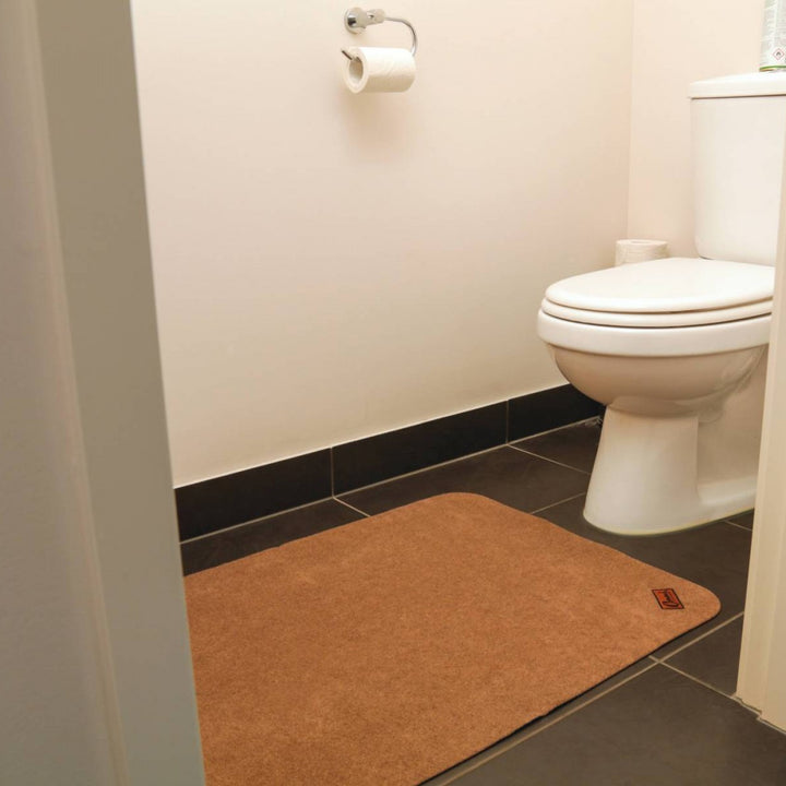 Conni Anti-Slip Floor Mat Classic Pebble in Manchester style, with textured surface and non-slip backing for safety.