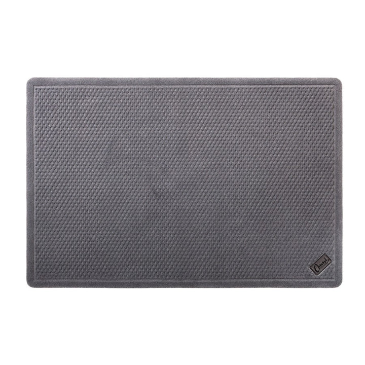 Conni grey waffle anti-slip and absorbent floor mat made of Manchester fabric, ideal for bathroom or kitchen use.