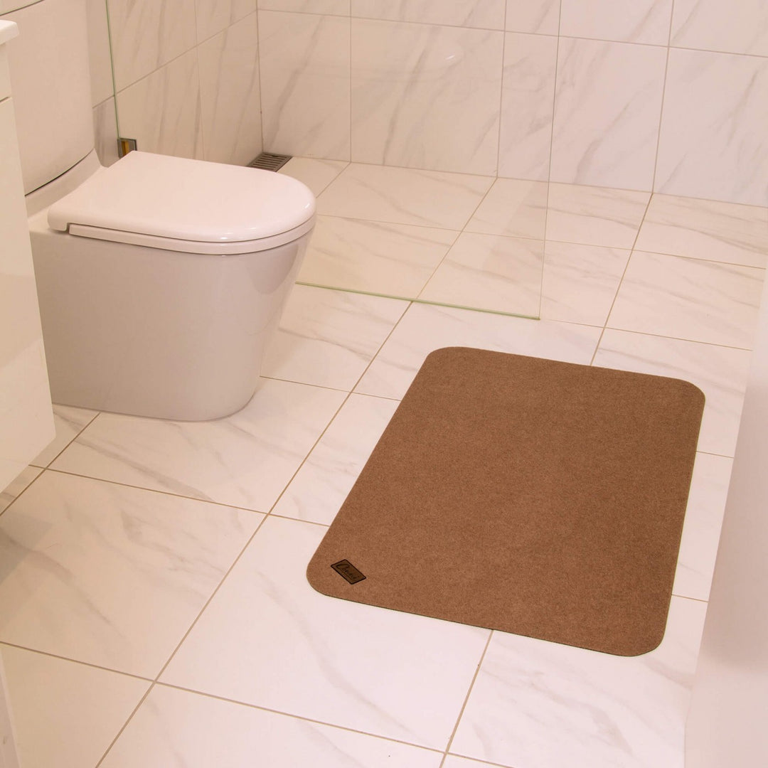 Conni Anti-Slip Floor Mat Classic Pebble in Manchester, featuring textured surface for safety and stability.
