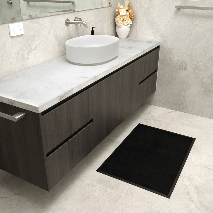 Black Manchester floor mat from Stay Dry Products, absorbent and durable for everyday use.