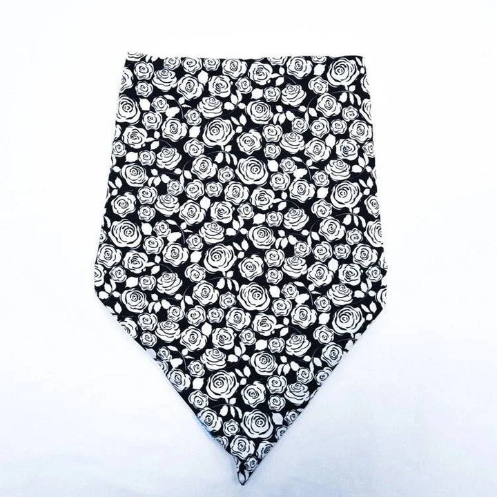 Black and white floral Brolly Bandana waterproof and absorbent adaptive clothing accessory by Brolly Sheets.