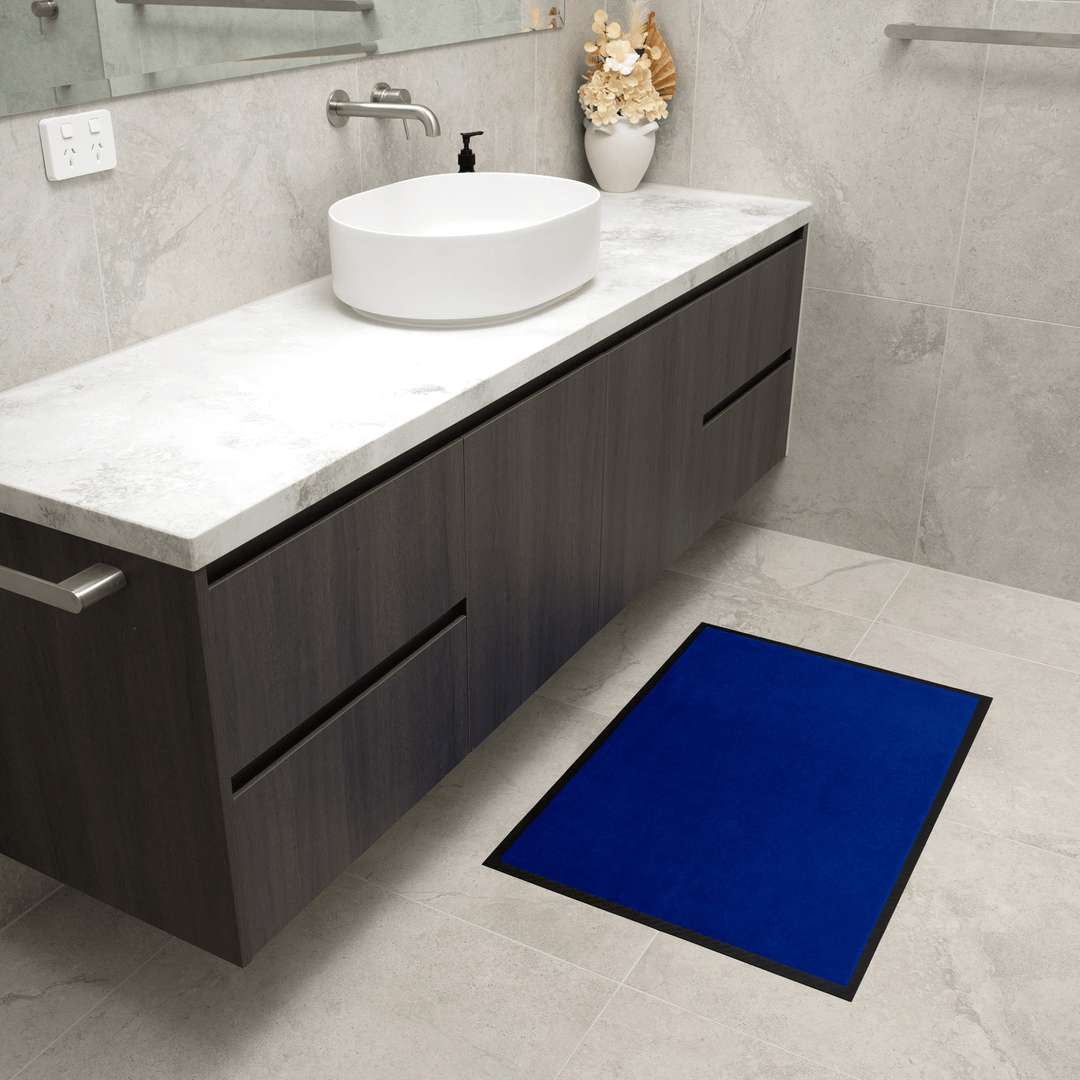 Blue Staydry Absorbent Manchester Floor Mat by Stay Dry Products, soft and durable for home or garage use.