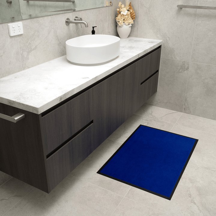 Blue Staydry Absorbent Manchester Floor Mat by Stay Dry Products, soft and durable for home or garage use.