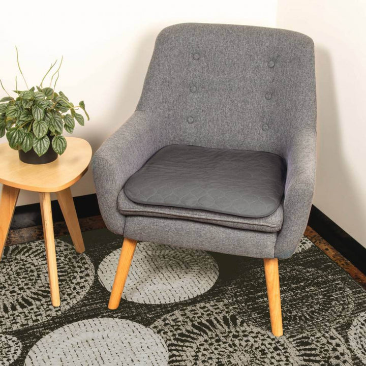 Conni small Manchester chair pad in a stylish design, showcasing soft fabric and comfortable cushioning.