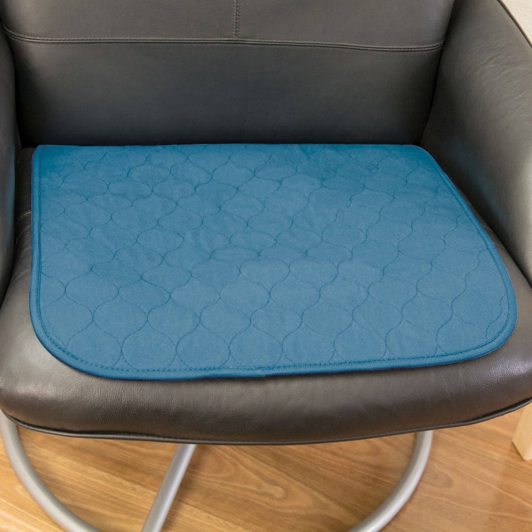 Teal Conni Chair Pad Small, featuring a soft fabric design, perfect for adding comfort to your seating.