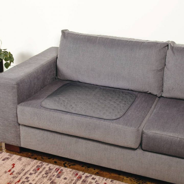 Large Conni chair pad in Manchester fabric, showcasing soft texture and stylish design for comfortable seating.
