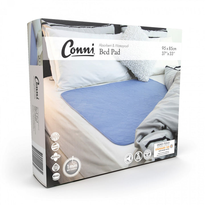 Conni Bed Pad in soft Manchester fabric, featuring a waterproof layer for added protection and comfort.