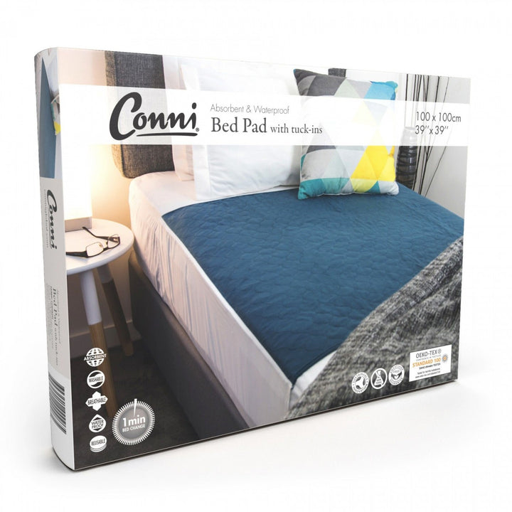 Conni Manchester Bed Pad with Tuck-ins, waterproof and soft fabric, designed for extra protection and comfort in bedding.