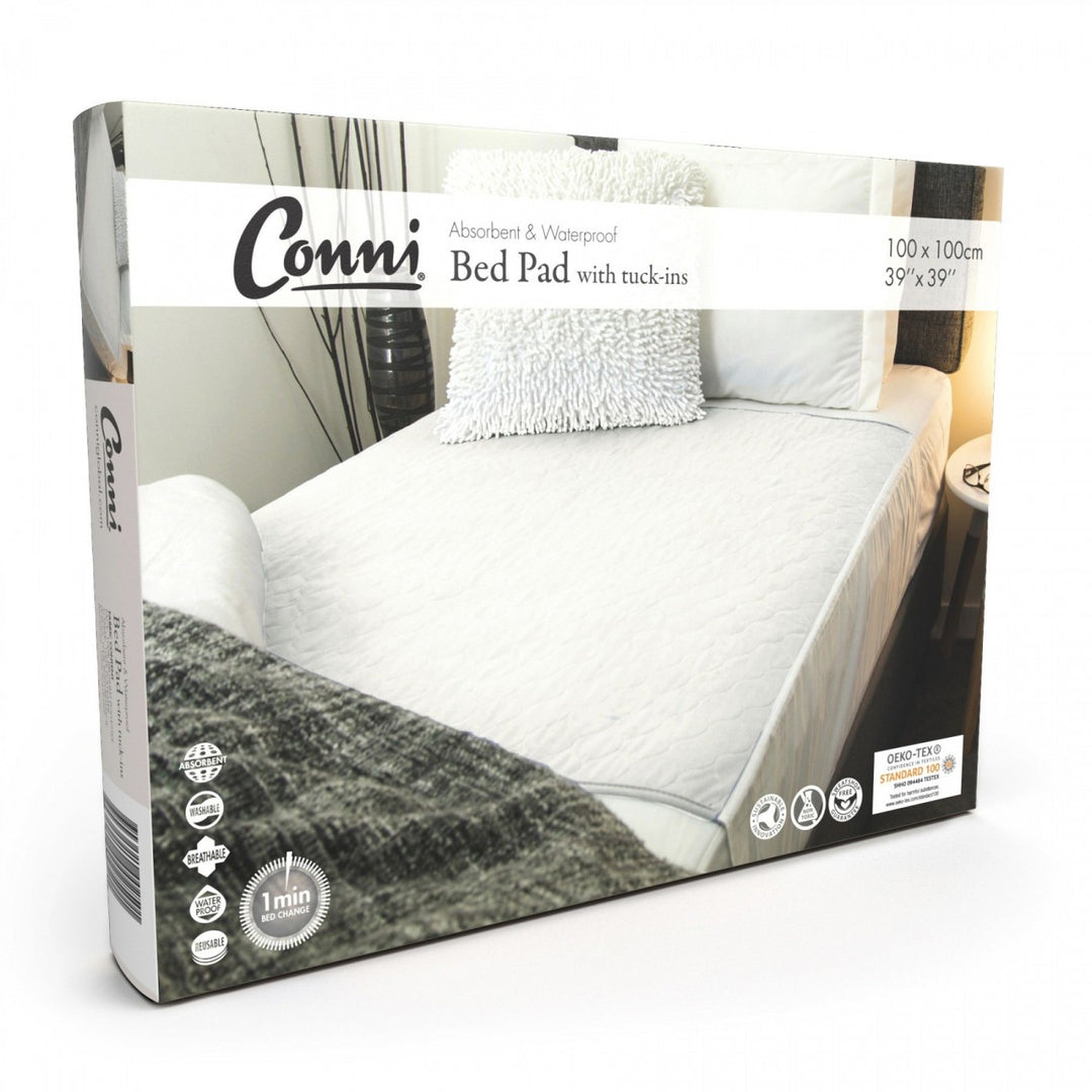 Conni Manchester Bed Pad with Tuck-ins, white waterproof protector with fitted edges for added comfort and secure fit.