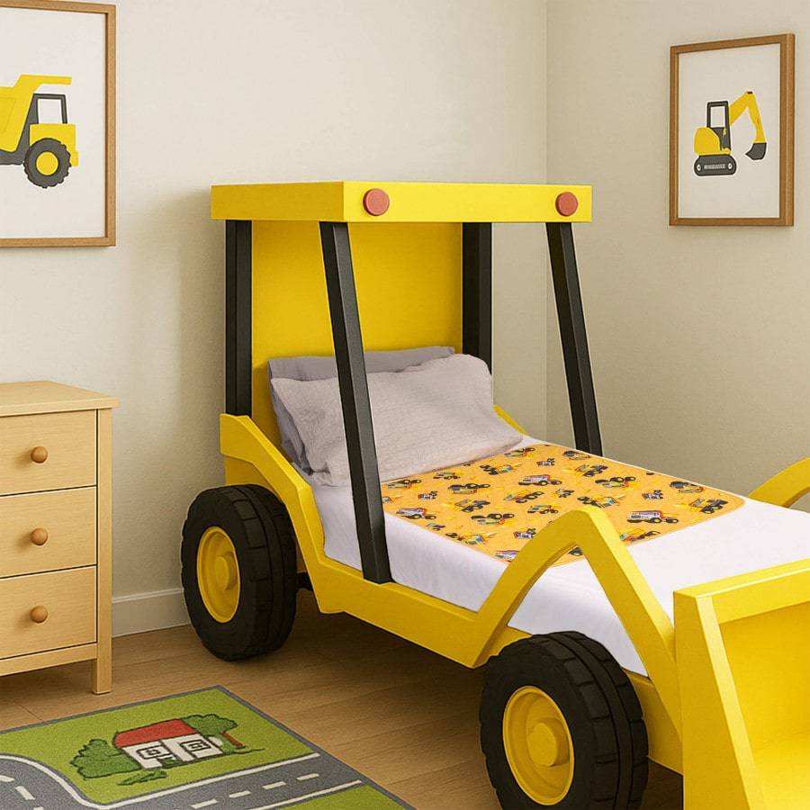 Conni Kids Bed Pad featuring a colorful truck print, designed for comfort and protection in children's bedding.