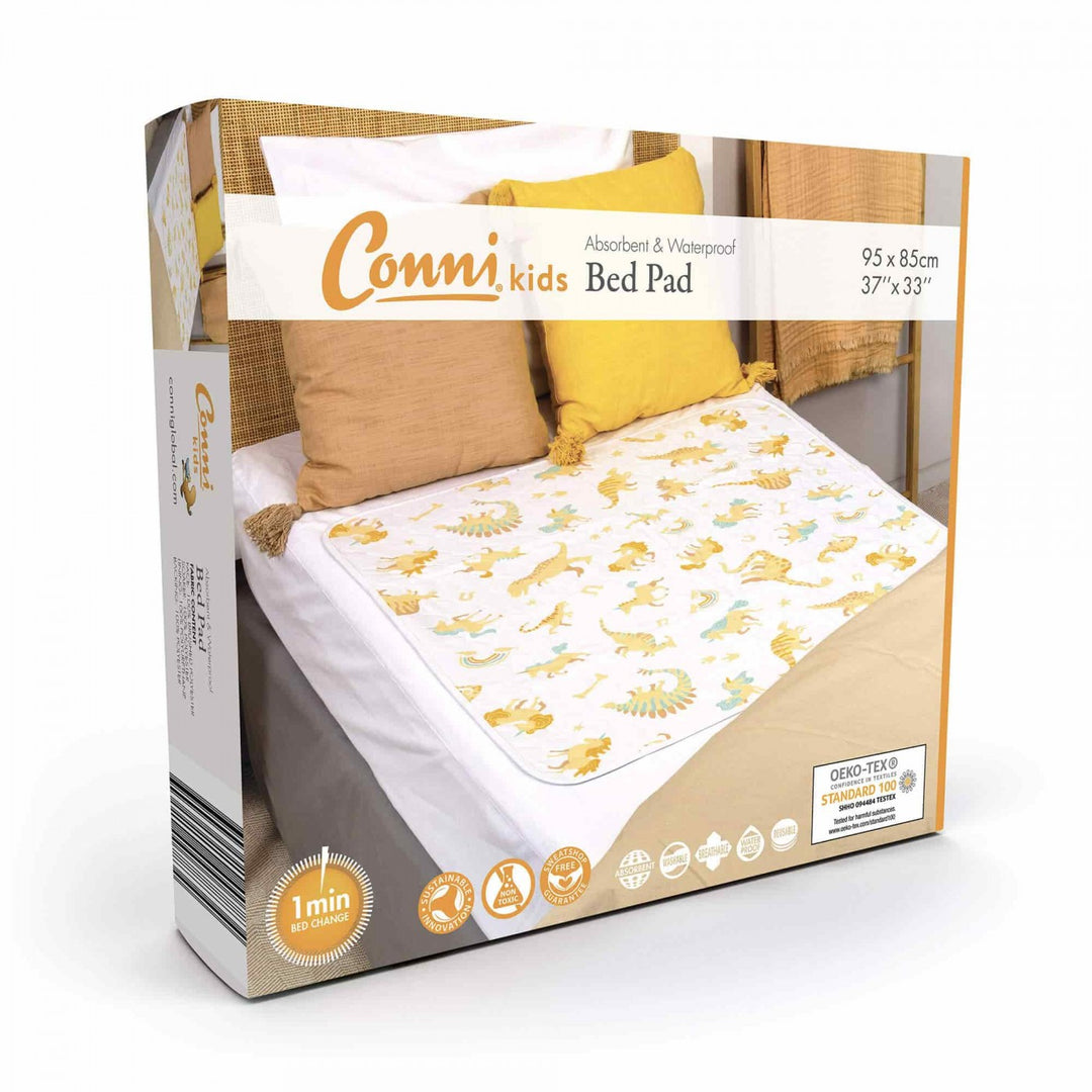 Conni Kids Bed Pad featuring a fun unicorn and dinosaur design, perfect for protecting beds during sleep.