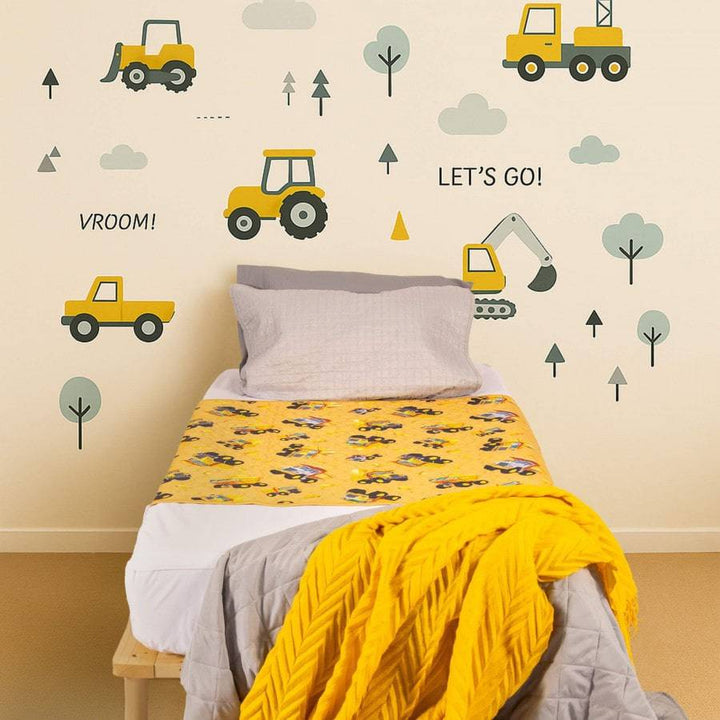Conni Kids bed pad with tuck-ins featuring a truck print, made of soft Manchester fabric, designed for children&