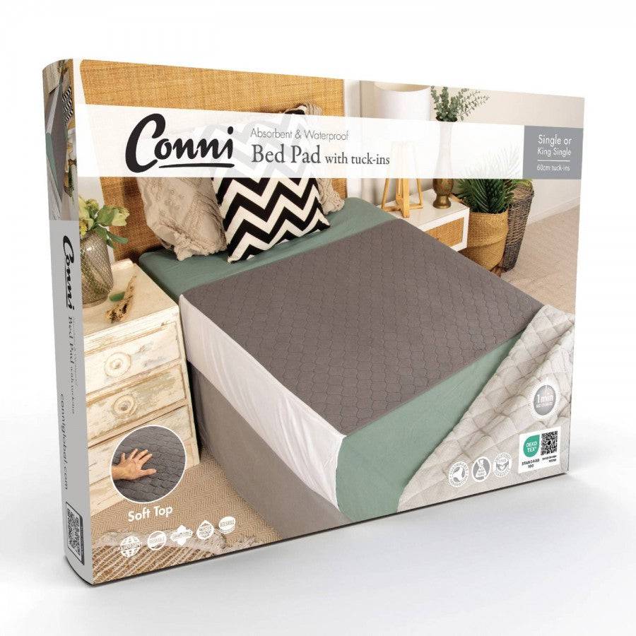 Conni plush top bed pad with tuck-ins for Manchester beds, soft and comfortable bedding accessory.
