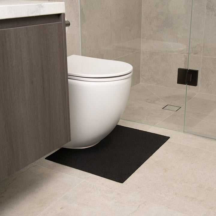 Black Staydry Low Profile Toilet Mat by Stay Dry Products, Manchester style, with a sleek, thin design for bathroom comfort.