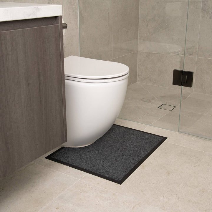 Charcoal Staydry Low Profile Toilet Mat by Stay Dry Products, Manchester style, featuring a soft, non-slip surface for bathroom comfort.