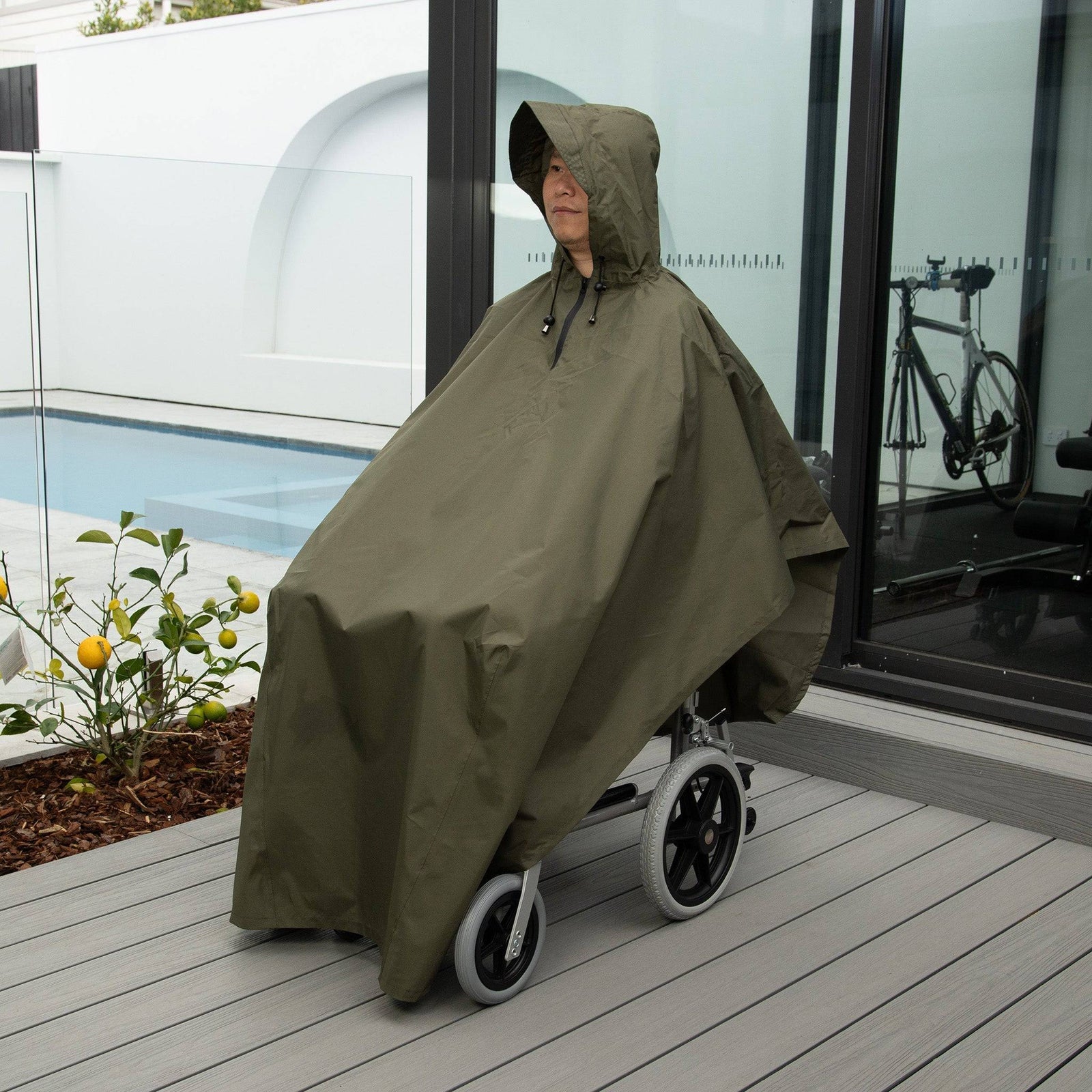 Staydry Wheelchair Poncho by Stay Dry Products, waterproof rain poncho designed for wheelchair users, shown in a close-up view.