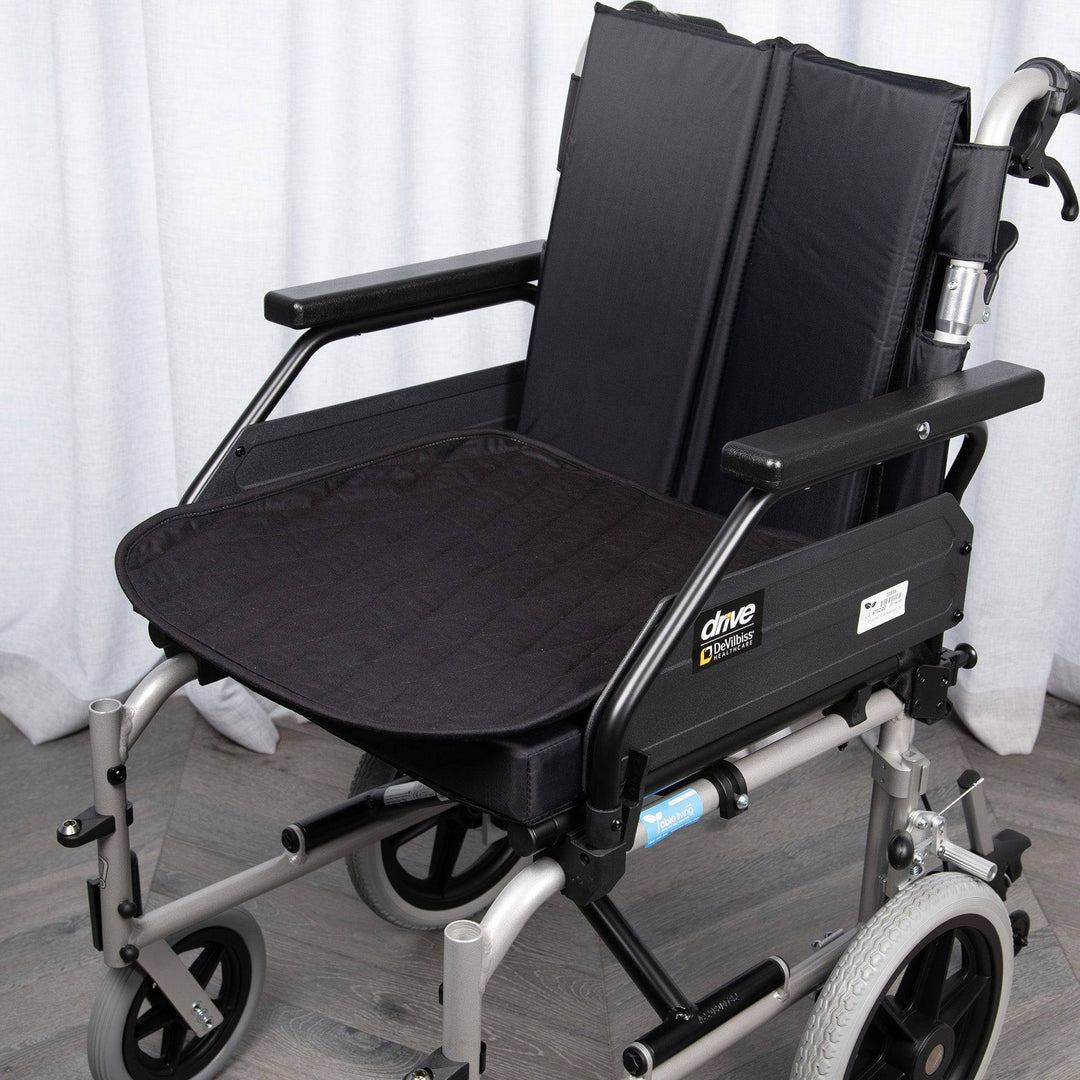 Black Staydry Manchester wheelchair chair pad by Stay Dry Products, designed for comfort and moisture protection.