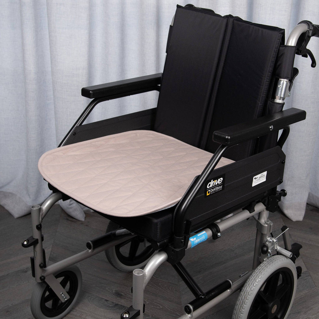 Staydry Manchester wheelchair chair pad by Stay Dry Products, bone-colored cushion with supportive, comfortable design for enhanced seating.