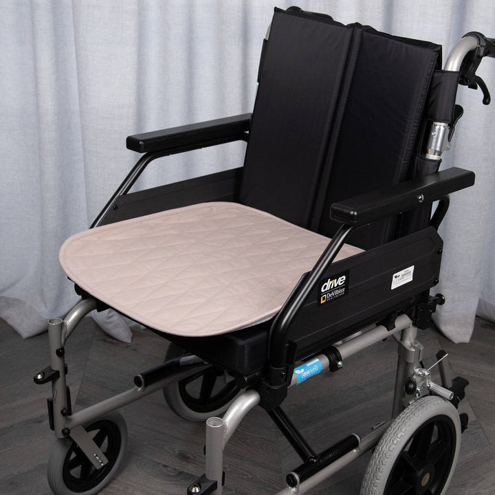 Staydry Manchester wheelchair chair pad by Stay Dry Products, bone-colored cushion with supportive, comfortable design for enhanced seating.