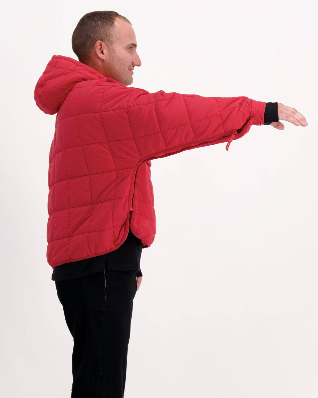 Red Elly Universal Adaptive Puffer Jacket by Christina Stephens, designed for wheelchair users with a cozy, stylish fit.