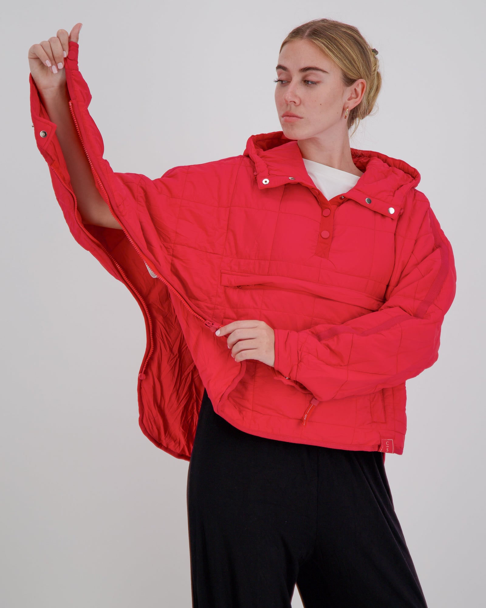 Red Elly Universal Adaptive Puffer Jacket by Christina Stephens, designed for wheelchair users with a stylish and functional fit.