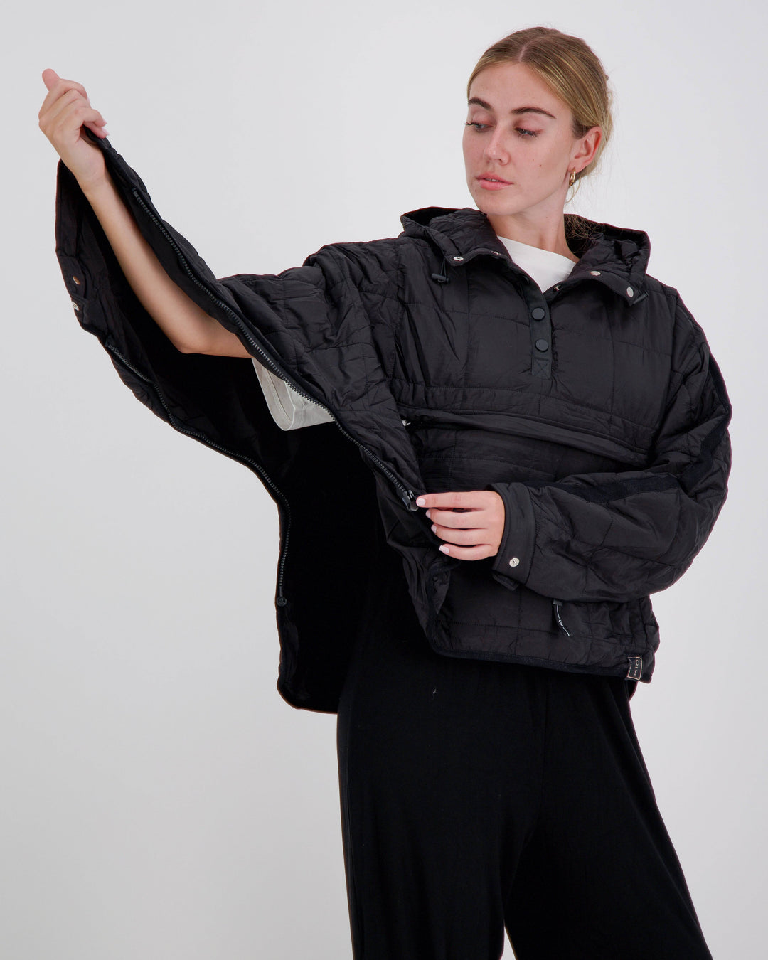 Black Elly Universal Adaptive Puffer Jacket for wheelchair users by Christina Stephens, showcasing a stylish and functional design.