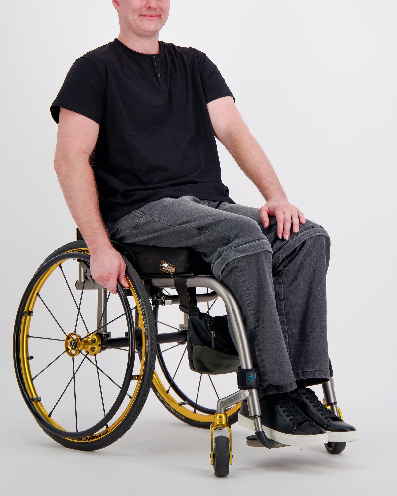 Black Christina Stephens Nick A-Line Tee, showcasing stain and spill resistant fabric with a relaxed fit.